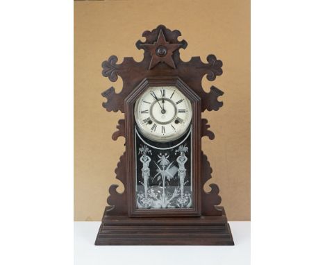 Late 19th Century American Ansonia Gingerbread Shelf Clock with carved detail, printed figural &amp; floral decoration to gla