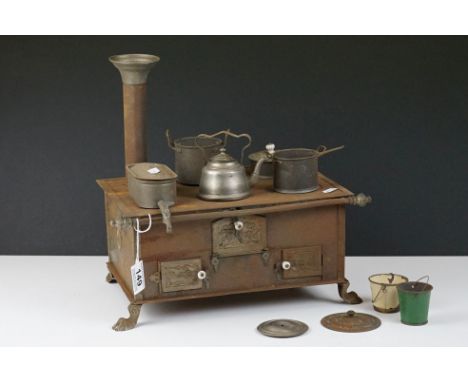 Early 20th Century childs tin plate toy cooking stove with cooking pots &amp; pans, chimney and hinged doors with ceramic kno