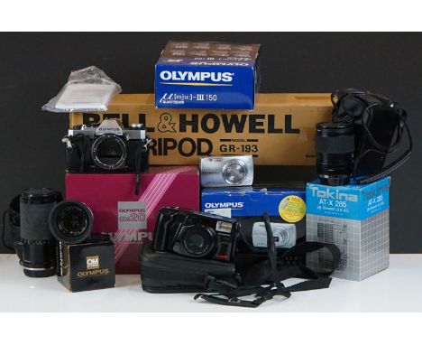 A collection of photography equipment to include an Olympus OM20 camera with Zuiko Auto-S 40mm lens, Tokina AT-X 285 28-85mm 