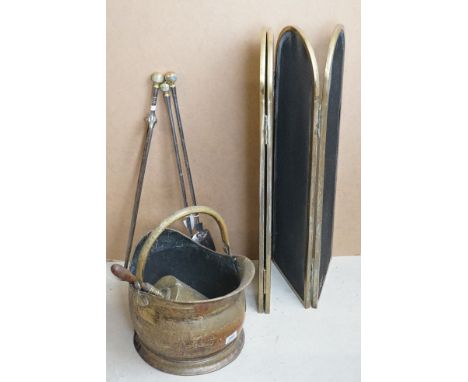 A brass fireside companion set together with a brass coal bucket and folding fire screen 