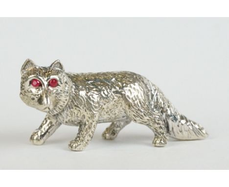 Silver figure of a Fox with Ruby Eyes 