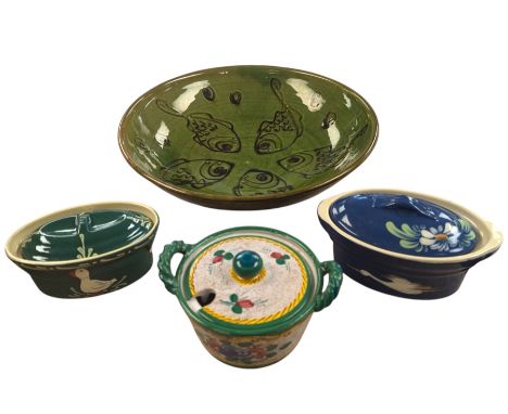 Coldstone bowl, decorated with fish on a green ground, together with three small cooking pots, dish D29cm