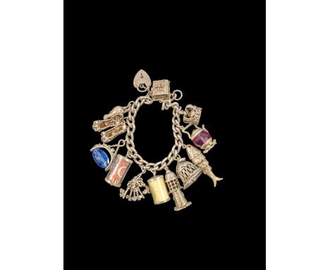 Silver charm bracelet, with twelve charms including lighthouse and articulated fishCondition Report:Approx 80 grams