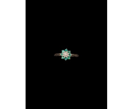 9ct gold emerald and diamond flower cluster ring, hallmarked Condition Report:Approx 1.2 grams, size M-N