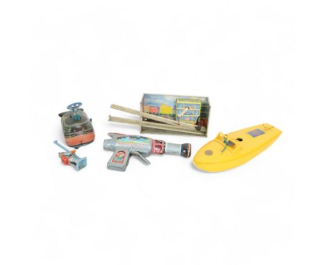 Sutcliffe Models Comet clockwork speedboat, boxed with key, together with a Russian tinplate garage toy, Japanese tin plate B