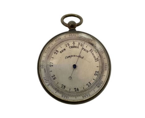 Edwardian pocket aneroid barometer in a brass case. Compensated.