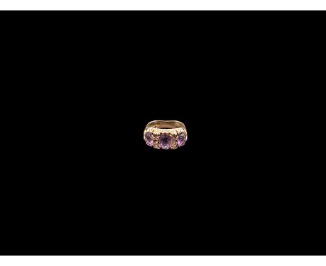 9ct gold amethyst ring, hallmarked Condition Report:Approx 4.9 grams, missing one small stone, bent 