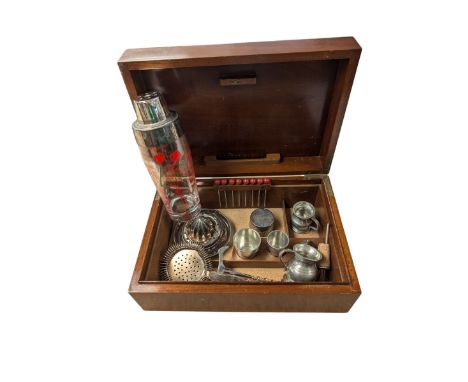 Mid 20th century wooden cocktail box, with fitted interior containing glass cocktail shaker, squeezer, measures, cocktail sti