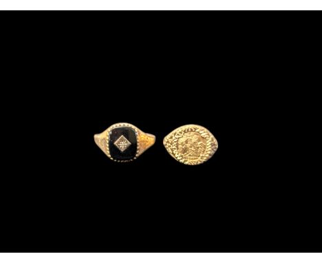 Two 9ct gold rings, to include onyx and diamond signet ring and a coin set signet ring, both hallmarkedCondition Report:4.49 