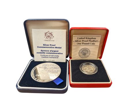 Royal Mint United Kingdom Silver Proof Piedfort one pound coin and a Royal Mint Silver Proof commemorative medal Euro Tunnel 