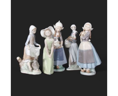 Four Lladro figures, including Dutch Girl with Duck no 5066, Rabbit Food no 4826 etc 