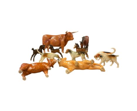 Collection of Beswick and similar figures, including hounds, cows and foals 