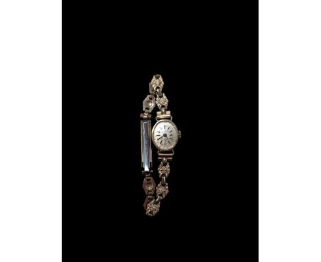 14ct gold cased Gevea ladies manual wind wristwatch on gilt metal braceletCondition Report:Back case only 0.75 grams