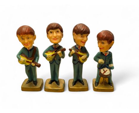 Set of four The Beatles plastic nodding / bobble head figures, H10cm