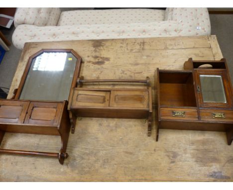 AN EDWARDIAN WALL HANGING MAHOGANY SMOKER'S CABINET, a combination bathroom mirror, cabinet and towel rail and a near matchin