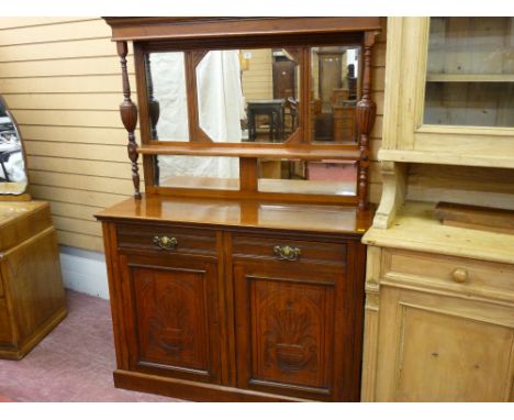 AN EDWARDIAN MAHOGANY MIRROR BACKED CHIFFONIER, the multiple mirrored back with shelf and turned and reeded support pillars, 