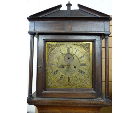 AN OAK & BRASS DIAL LONGCASE CLOCK, the dial marked 'Owen, Llanrwst', single door square hood with reeded pillars, enclosing 