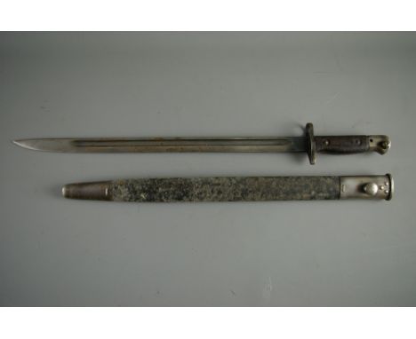 A BRITISH 1907 PATTERN SWORD BAYONET in leather scabbard, the hilt dated and stamped 'J A C'