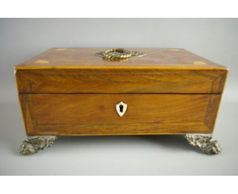 A REGENCY MAHOGANY & CROSSBANDED ROSEWOOD BOX having a decorative ring pull lid handle and satinwood inlaid spandrels, a drop