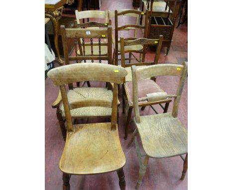 A RUSH SEATED SPINDLEBACK ARMCHAIR, four vintage farmhouse chairs and three others