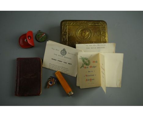 A WORLD WAR I CHRISTMAS TIN & CONTENTS including a 1915 card 'From Princess Mary & Friends at Home', poem ephemera from the 1
