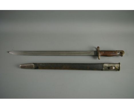 A BRITISH 1907 PATTERN SWORD BAYONET, the hilt date marked, stamped 'WSC' in leather scabbard, 57.5 cms long complete