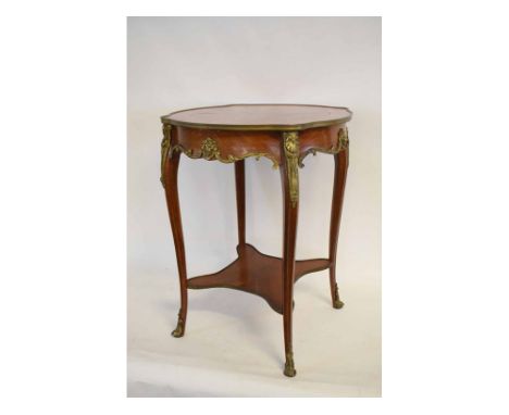 French kingwood circular two-tier table with a segmented inlaid top with brass banding, with decorative cast mounts, with ope