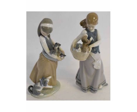 Lladro group of young girl with kittens and a further Lladro group of a young girl with puppies, both 23cms high, boxes avail