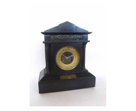 Late 19th century black marble mantel clock, the architectural case with classical frieze panel beneath an arched pediment an