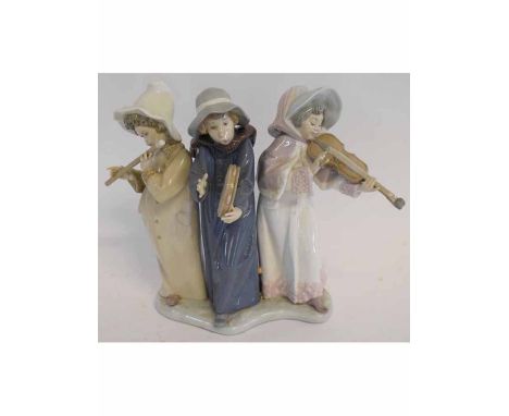 Lladro group of three female musicians, 24cms high, box available 