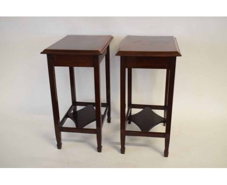 Pair of Edwardian rectangular mahogany formed side tables fitted with open work shelf, supported on four tapering square spad