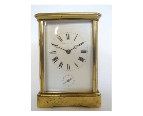 Early 20th century French lacquered brass carriage clock, EM & Co, 321, the movement (lacking platform) with strike on a back