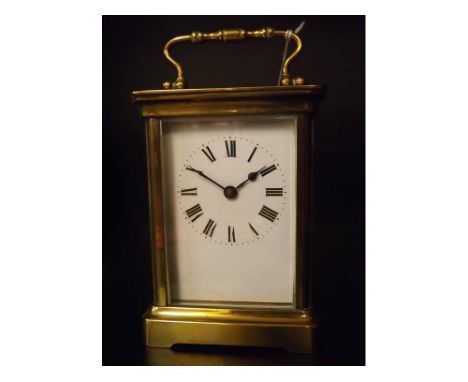 Early 20th century French lacquered brass carriage timepiece, the cylinder platform escapement to a Roman enamel dial with ou