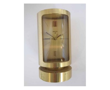 Last half of 20th century Swiss lacquered brass cased 8-day alarm clock, Swiza, the Swiss movement to a rectangular gilt dial