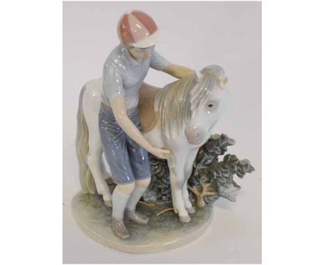 Lladro group of young jockey and pony, 23cms high, box available  