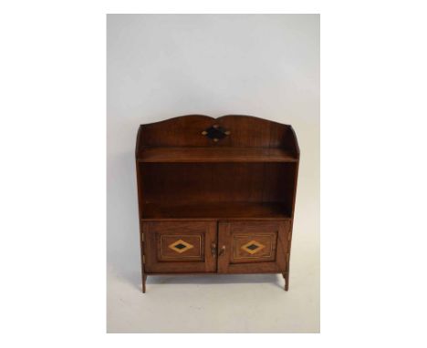 Late 19th/early 20th century small oak wall cabinet with open shelf, fitted with two later inlaid cupboard doors, 41cms wide 