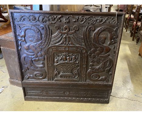 A French carved oak panel, width 104cm, height 103cm