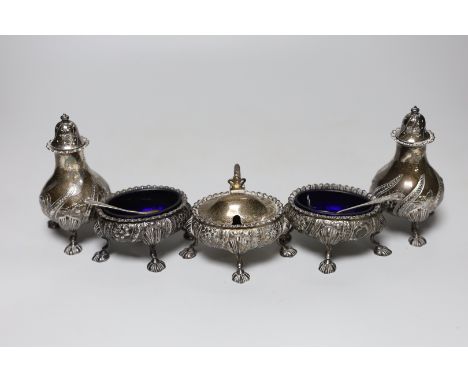 A George V five piece silver condiment set, William Hutton &amp; Sons, Sheffield, 1928, with two associated spoons, one plate