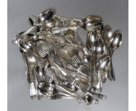 A Victorian part canteen of silver flatware by George Adams, comprising twelve table spoons, twelve table forks, twelve desse