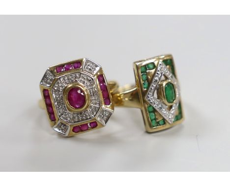 A modern 9ct gold, emerald and diamond chip cluster set table ring, size N and a similar ruby and diamond chip cluster set ri