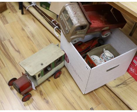 A tin plate model fire engine, lorry and bus, etc.