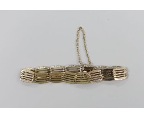A modern 9ct gold fancy gate link bracelet, 17cm, 13.9 grams.