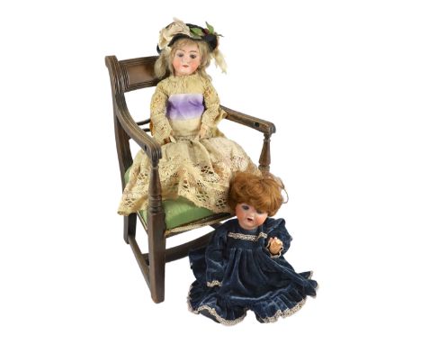 An Armand Marseille bisque doll, German, circa 1935, impressed 1330 A 7M, with open mouth, trembling tongue, weighted blue gl