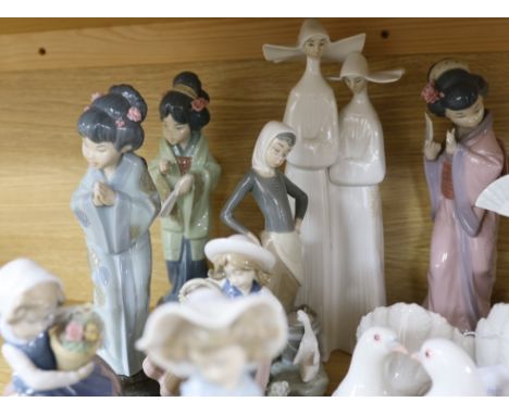 A selection of fifteen Lladro figures, tallest 35cm