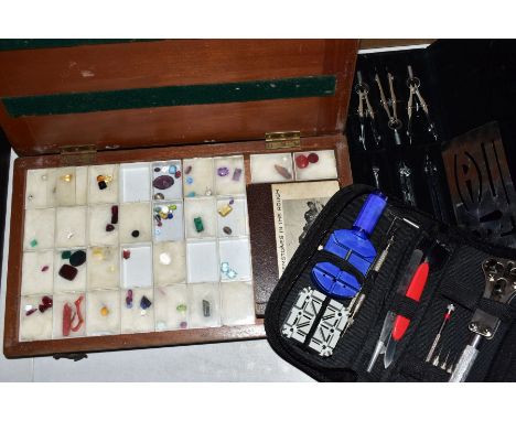 A WRISTWATCH TOOL KIT, A GEMSTONE SET AND A CASED SET OF COMPASSES, the watch tool kit includes a case back knife, a link rem