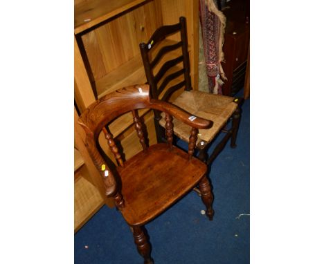 AN EARLY 20TH CENTURY AND LATER OAK AND MAHOGANY SMOKERS CHAIRS with turned spindles and a dish seat together with a rush sea