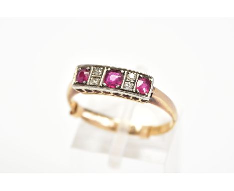A RUBY AND DIAMOND RING, designed with three circular cut rubies interspaced by four single cut diamonds, estimated total dia