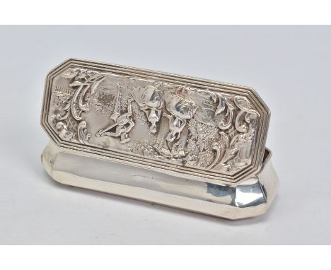 A LATE VICTORIAN SILVER TRINKET BOX OF SHAPED RECTANGULAR FORM, the hinged lid repousse decorated with a fete champetre, make