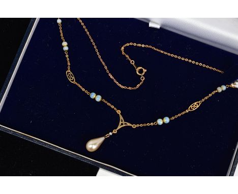 AN IMITATION PEARL AND GLASS BEAD NECKLACE, designed as an imitation pearl drop suspended from an openwork triangular panel t