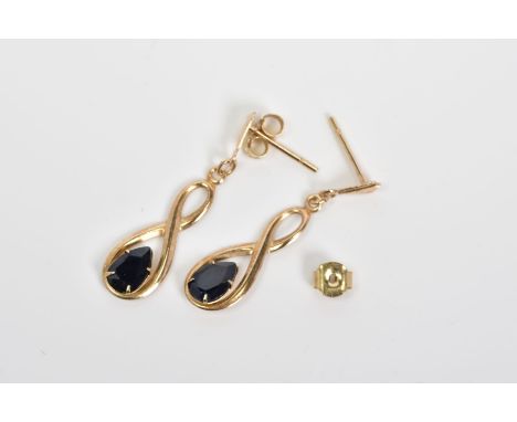 A PAIR OF DROP EARRINGS, each designed with a pear cut sapphire within an infinity loop design, to the scroll and post fittin
